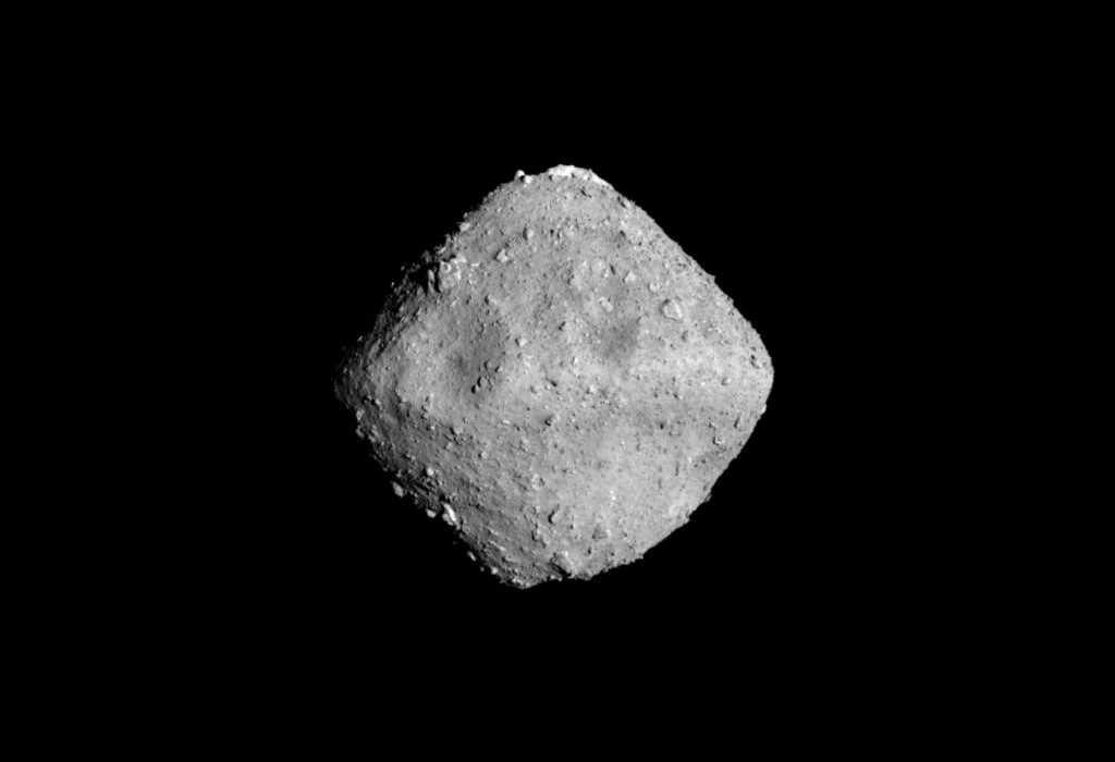 Asteroid Ryugu is photographed by the ONC-T which is equipped on Hayabusa 2 probe after a journey of around 3.2 billion km since launch, in outer space 280 million km from the Earth in this handout photo